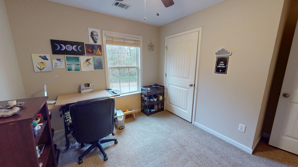 5260 Kingsberry Lane Columbus, GA 31907 - Photo 10 of 23 a view of a workspace with furniture and a window