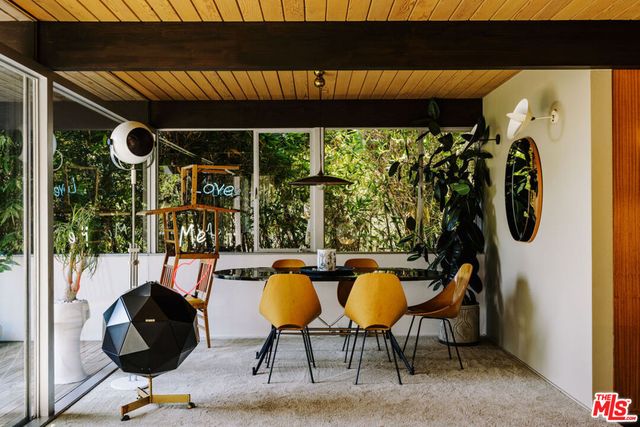 a view of an outdoor sitting area with fire pit