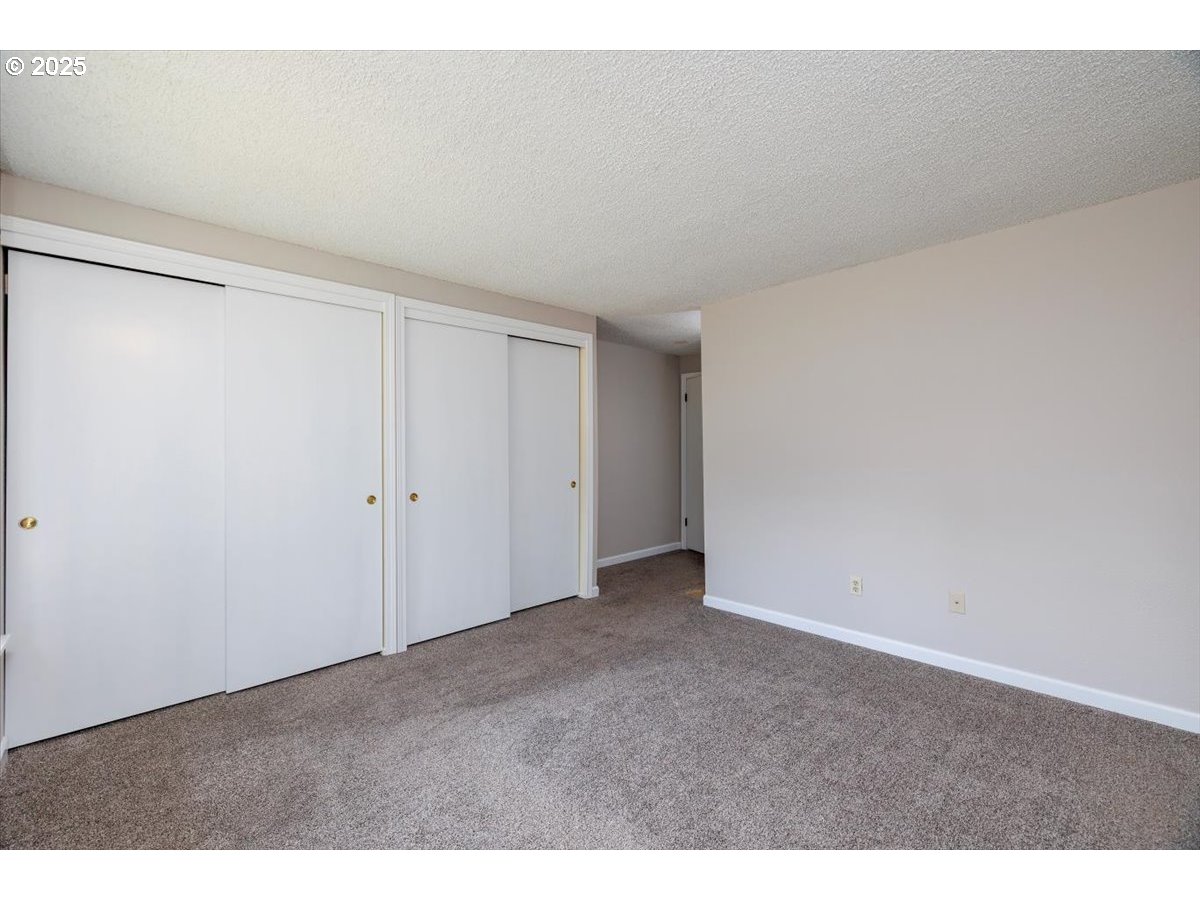 2610 Southwest 204th Avenue Beaverton, OR 97003 - Photo 20 of 37 a view of an empty room