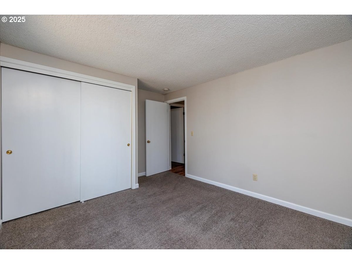 2610 Southwest 204th Avenue Beaverton, OR 97003 - Photo 25 of 37 a view of an empty room
