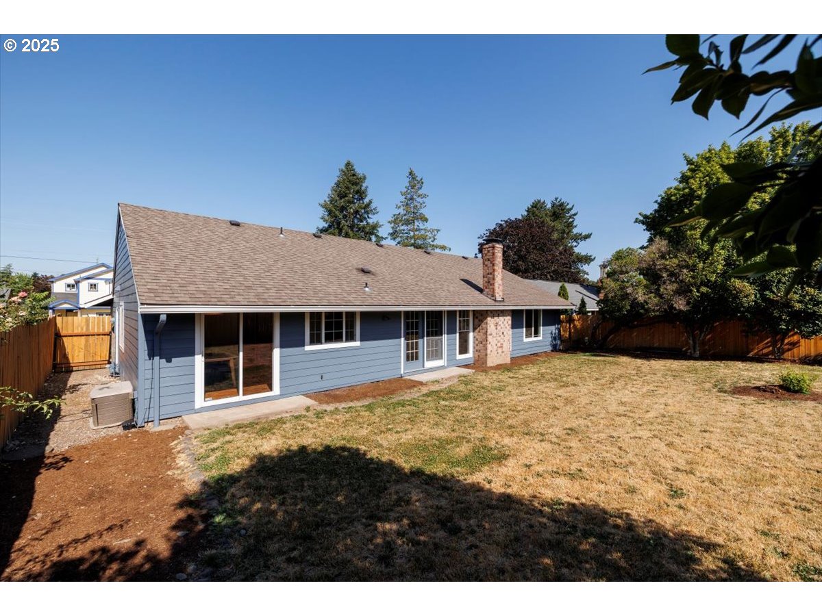 2610 Southwest 204th Avenue Beaverton, OR 97003 - Photo 27 of 37 a view of a house with a yard