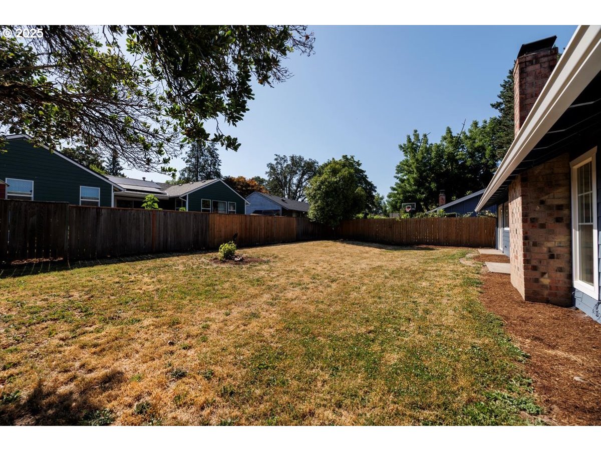 2610 Southwest 204th Avenue Beaverton, OR 97003 - Photo 30 of 37 a backyard of a house