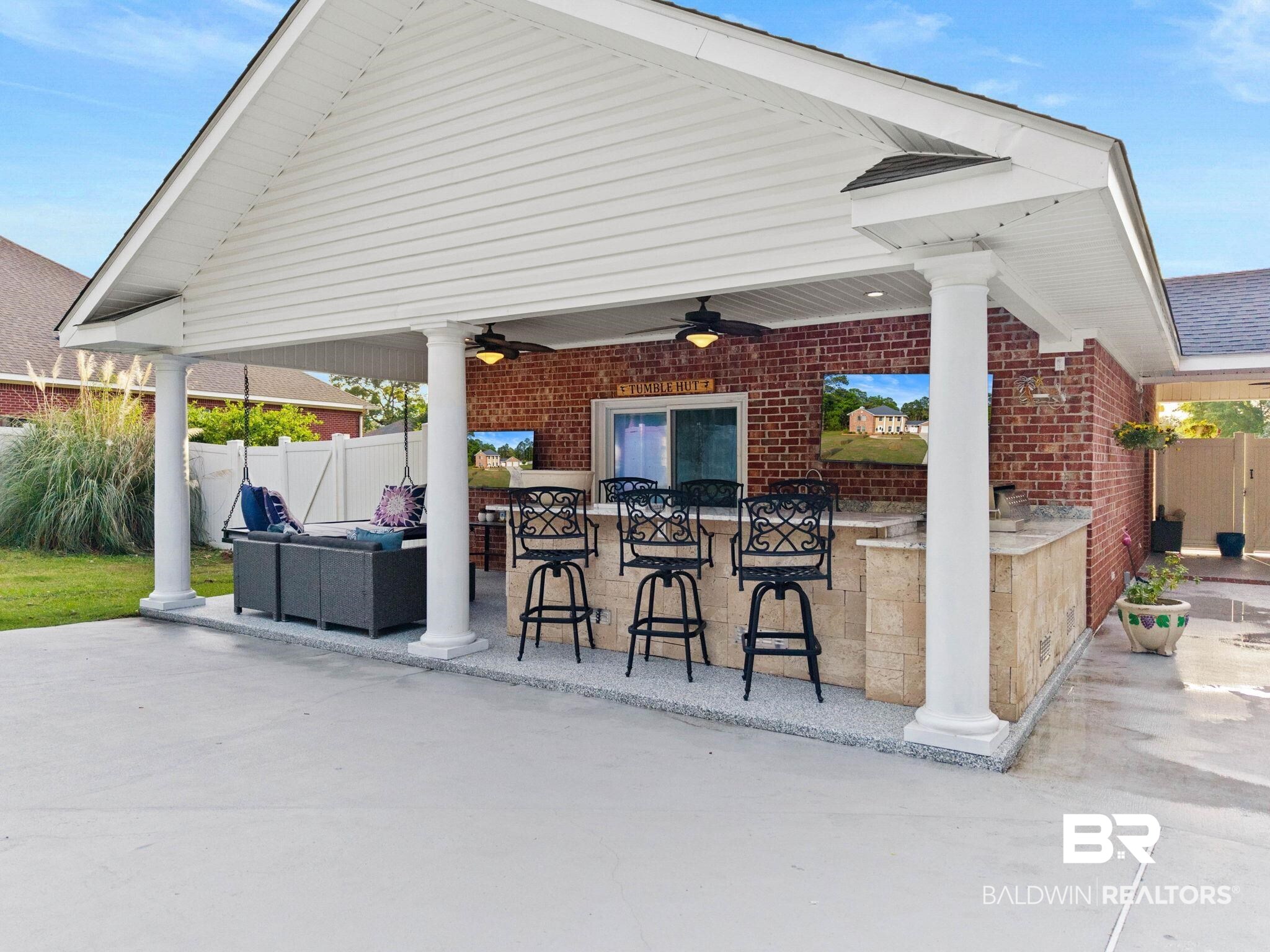 2 Speckle Trout Route Daphne, AL 36527 - Photo 36 of 61 View of patio featuring exterior bar and a ceiling fan