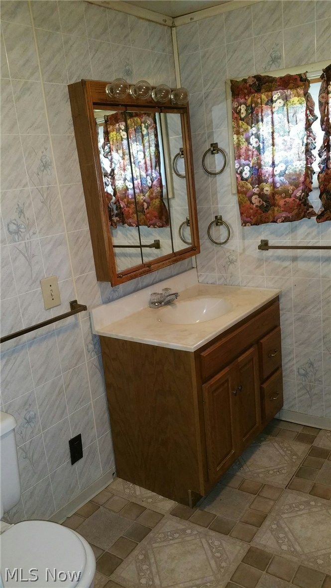 6308 Wayland Road Ravenna, OH 44266 - Photo 12 of 22 First view of first floor full bathroom with shower stall.
