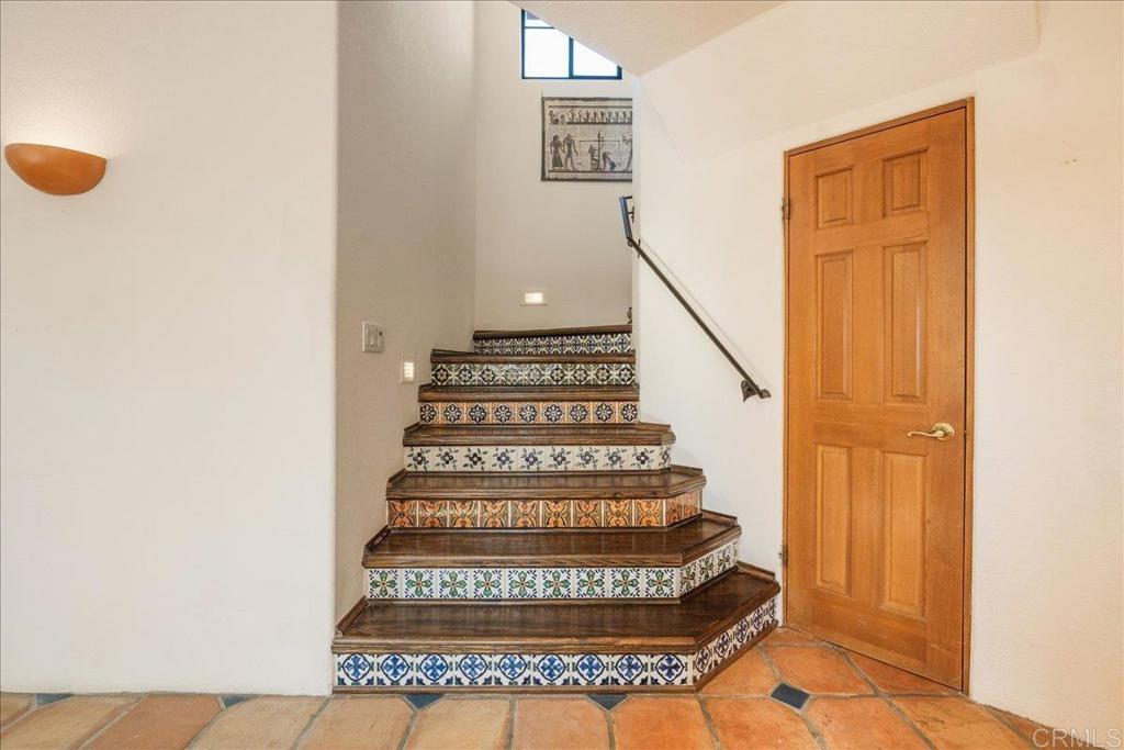 3577 Stonegate Place Fallbrook, CA 92028 - Photo 19 of 60 There are 3 stairs leading to the 2ns level, but this is the primary which leads to the bridge.