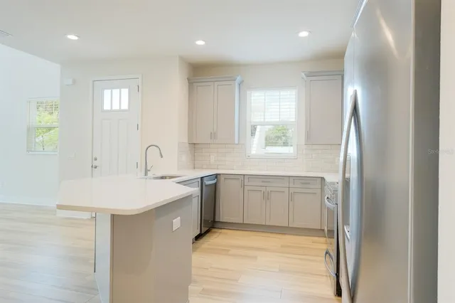 an empty room with windows