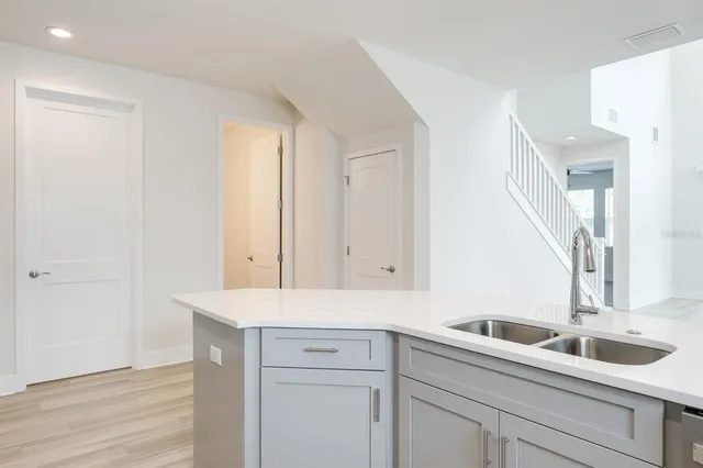 a bathroom with a shower toilet and sink