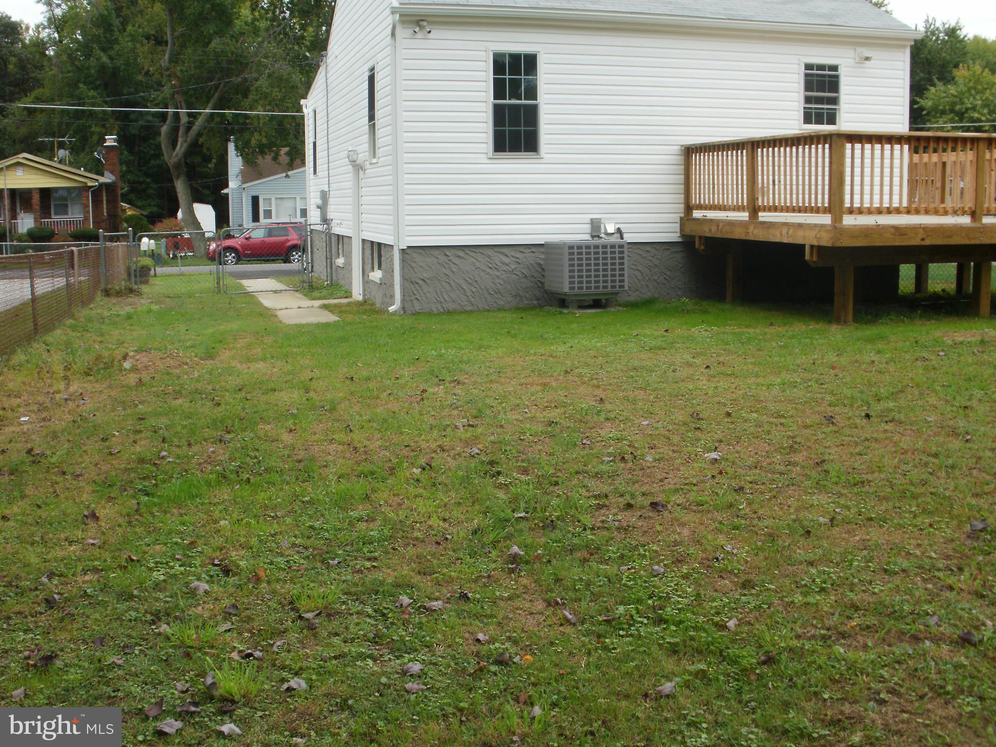 7350 Chesapeake Road Middle River, MD 21220 - Photo 20 of 21 a view of a house with a backyard