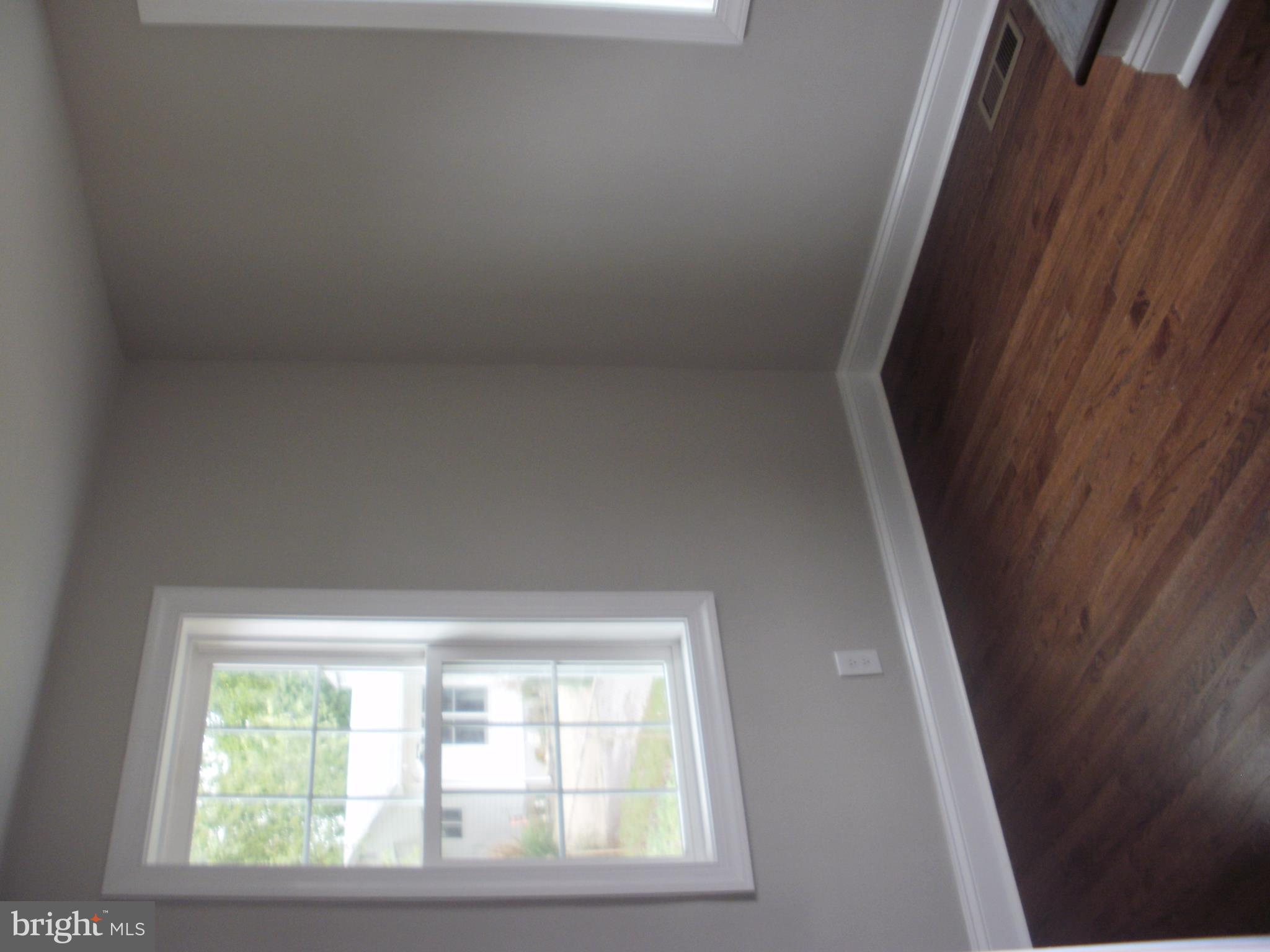 7350 Chesapeake Road Middle River, MD 21220 - Photo 9 of 21 a view of an empty room with a window
