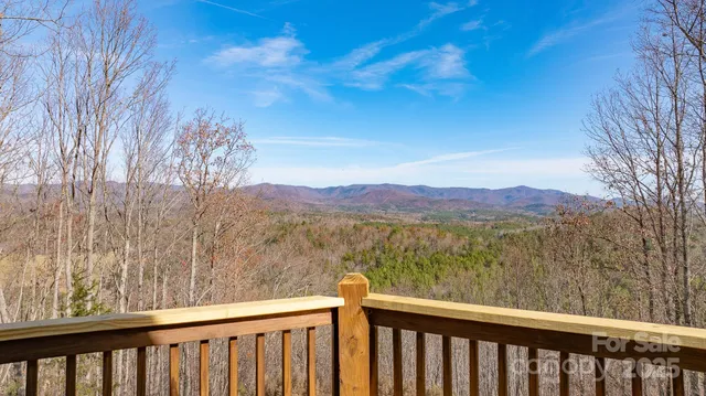a view of a lake from a balcony