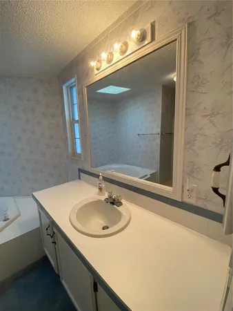 a bathroom with a bathtub