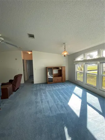 a view of livingroom with furniture