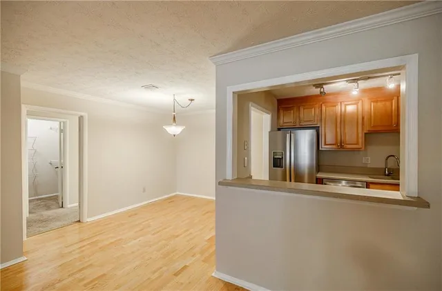 a view of a living room with a large window