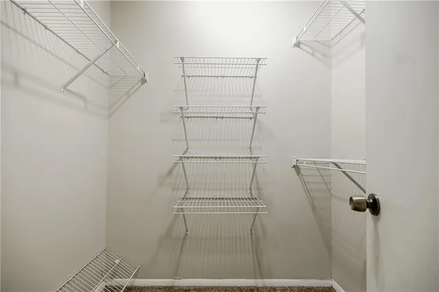 a view of a room with racks on the wall