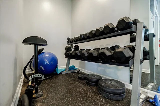 a view of a swimming pool with chairs