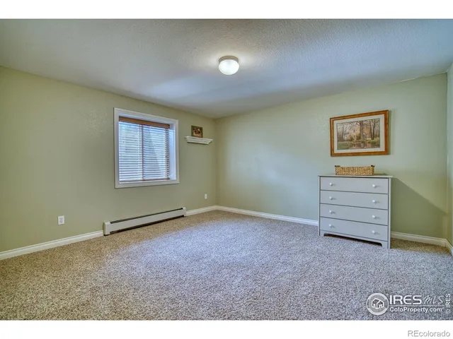 a view of room with stairs and a window