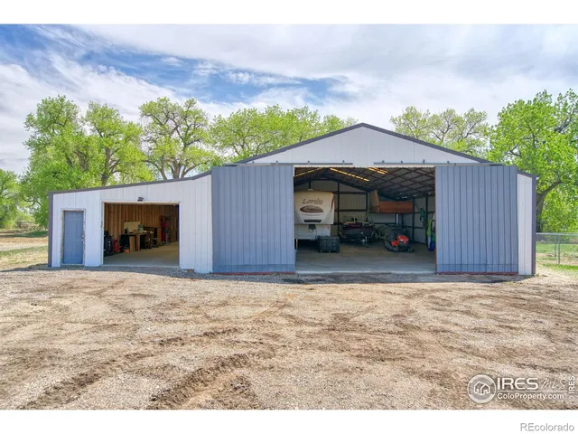 a view of a garage with storage