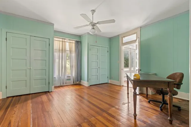 a view of a livingroom with furniture and wooden floor