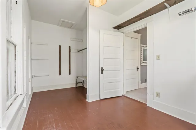 an empty room with windows