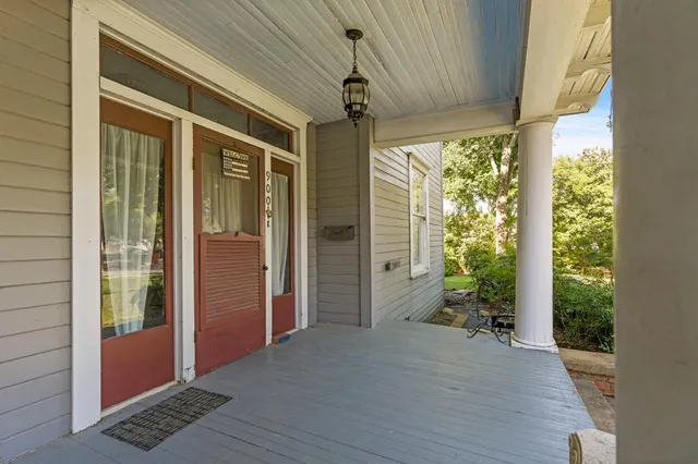 a view of entryway with wooden floor and garden