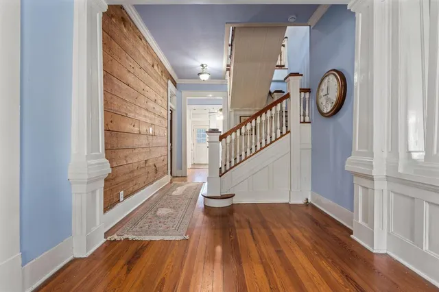 a view of entryway with wooden floor