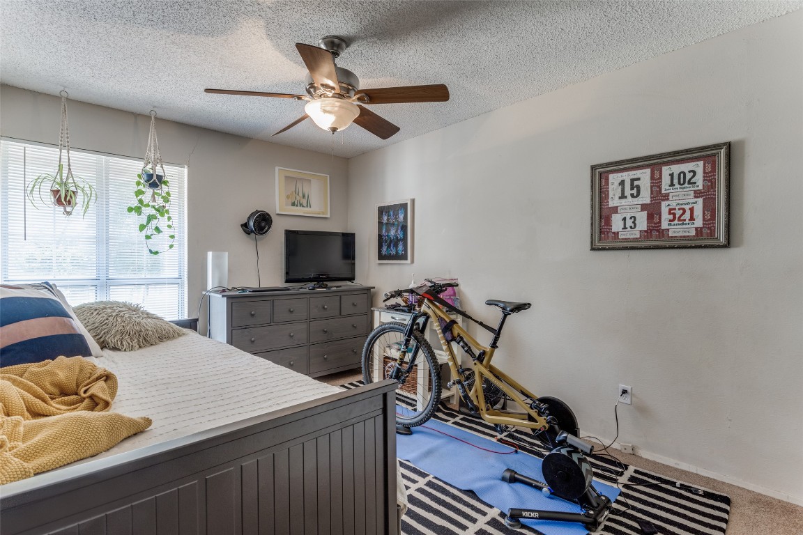 2713 Tether Trail Austin, TX 78704 - Photo 18 of 22 a living room with furniture and a flat screen tv