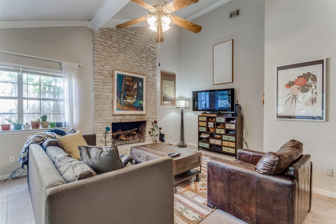 2713 Tether Trail Austin, TX 78704 - Photo 4 of 22 a living room with furniture and a fireplace