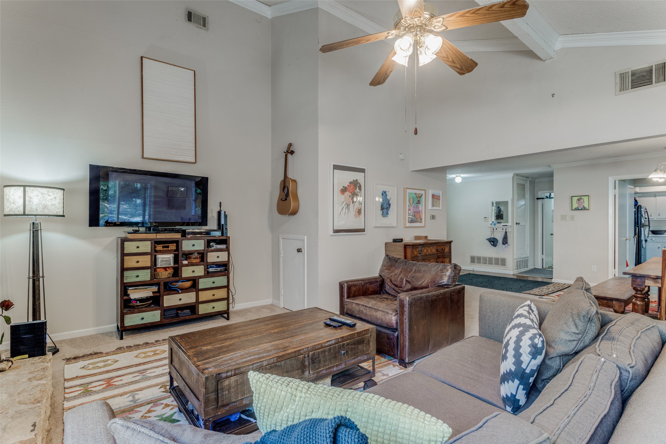 2713 Tether Trail Austin, TX 78704 - Photo 6 of 22 a living room with furniture and a flat screen tv