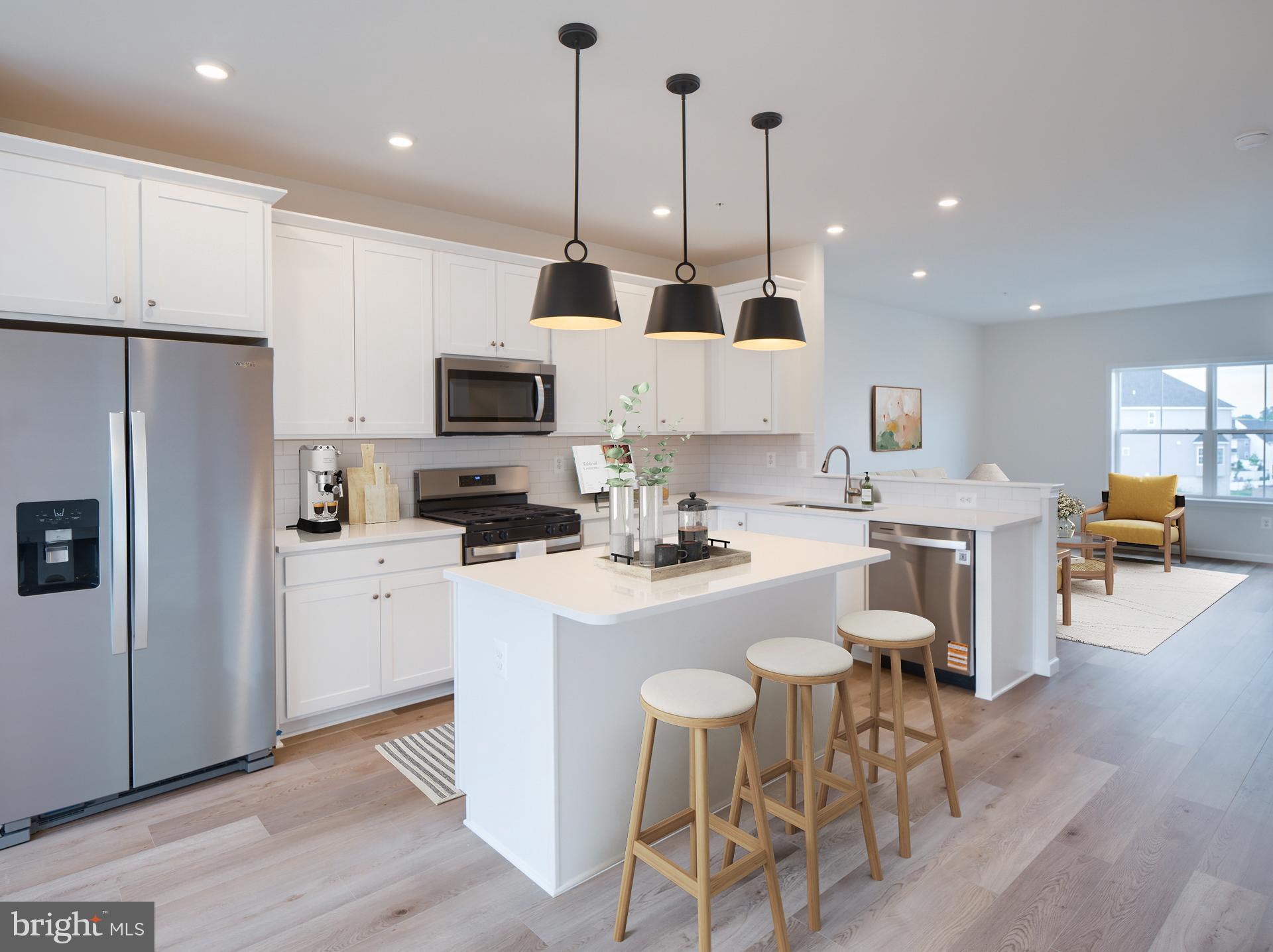2615 Front Shed Drive Frederick, MD 21702 - Photo 2 of 78 a kitchen with stainless steel appliances a stove a sink a microwave a refrigerator and cabinets