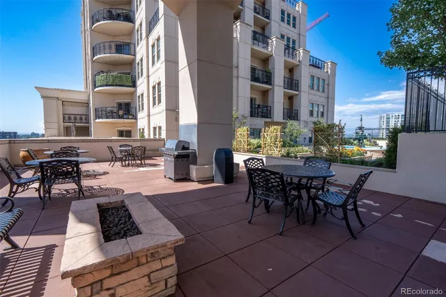 a view of a balcony with chairs