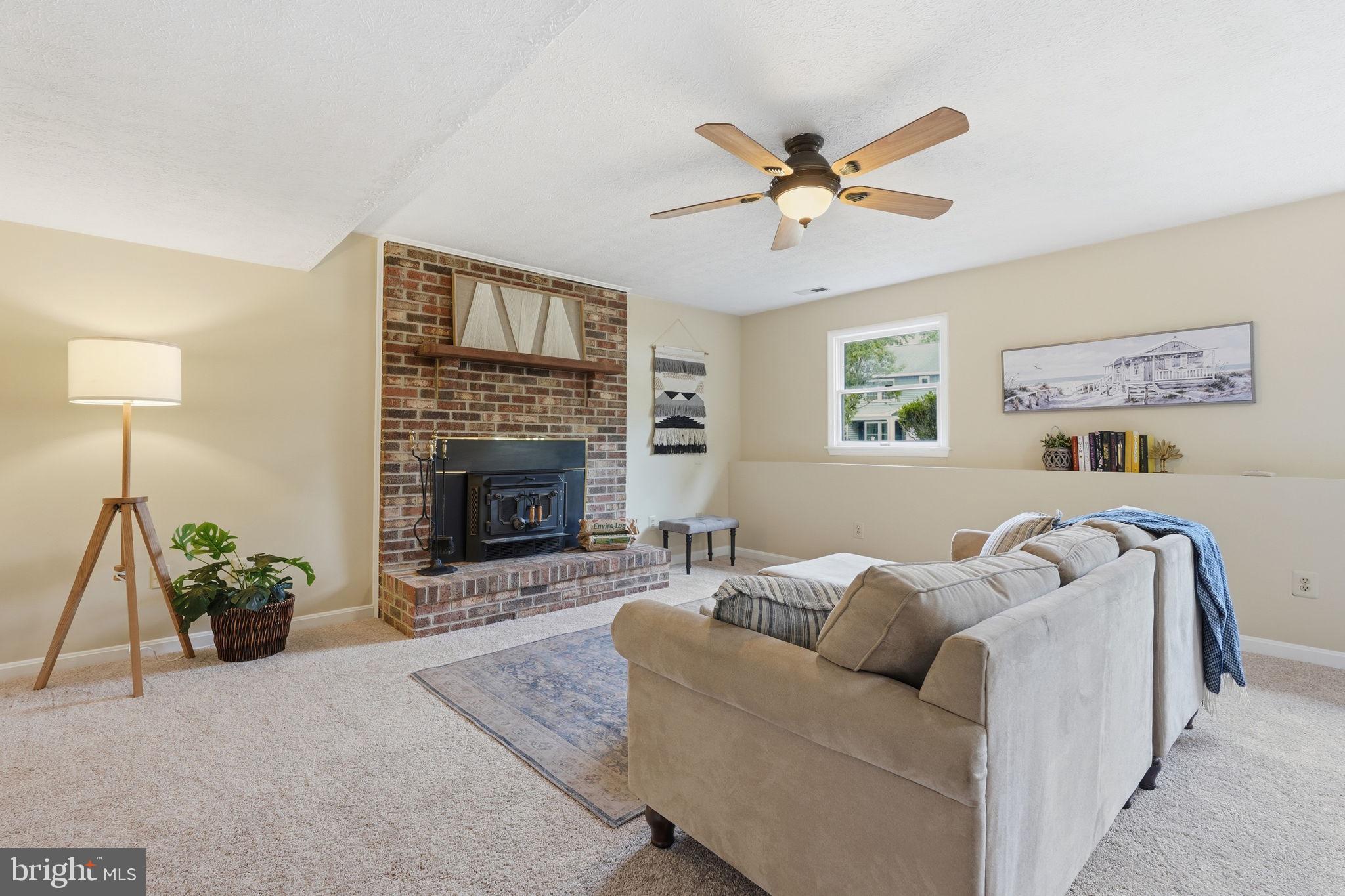 1007 Tasker Lane Arnold, MD 21012 - Photo 23 of 39 Cozy up around the fireplace!