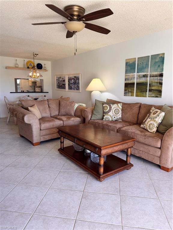 605 Augusta Boulevard, Unit 4 Naples, FL 34113 - Photo 2 of 14 a living room with furniture