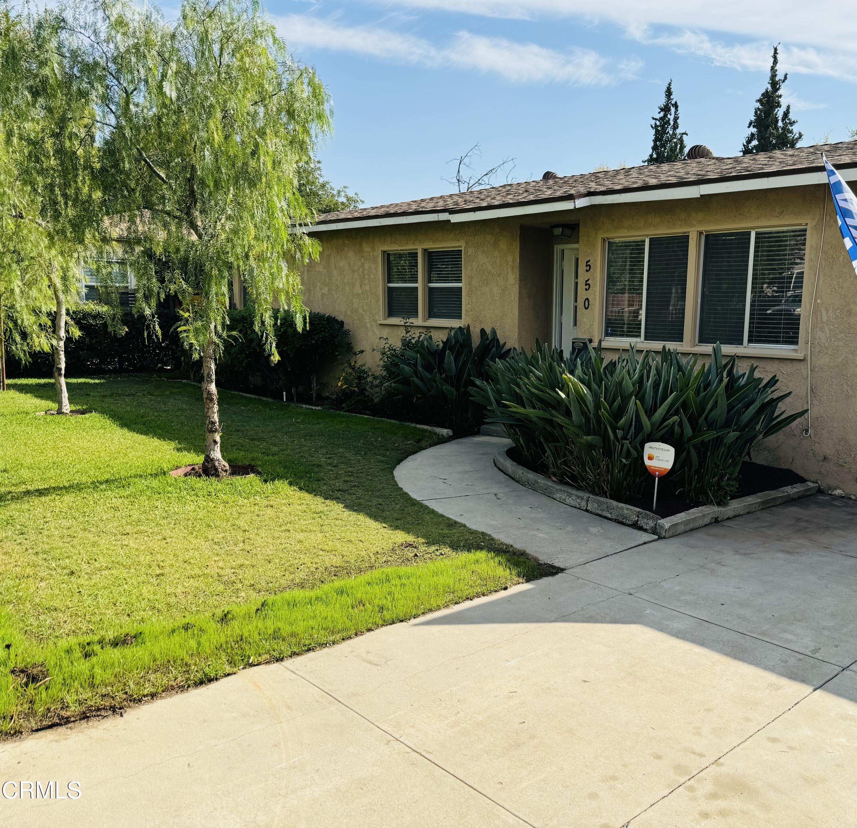 a house view with a garden space