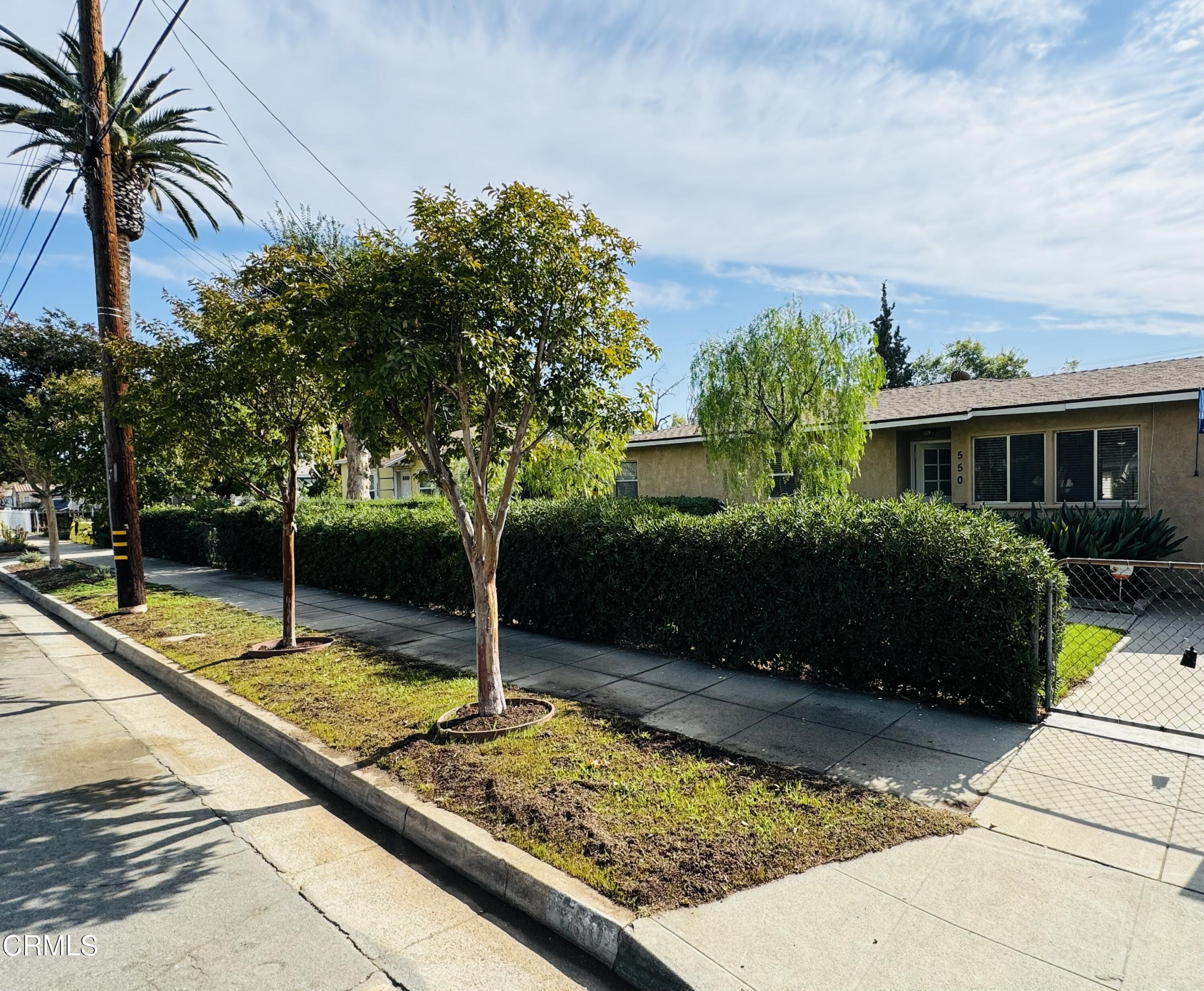 550 MacDonald Street Pasadena, CA 91103 - Photo 2 of 63 a view of a swimming pool with a patio