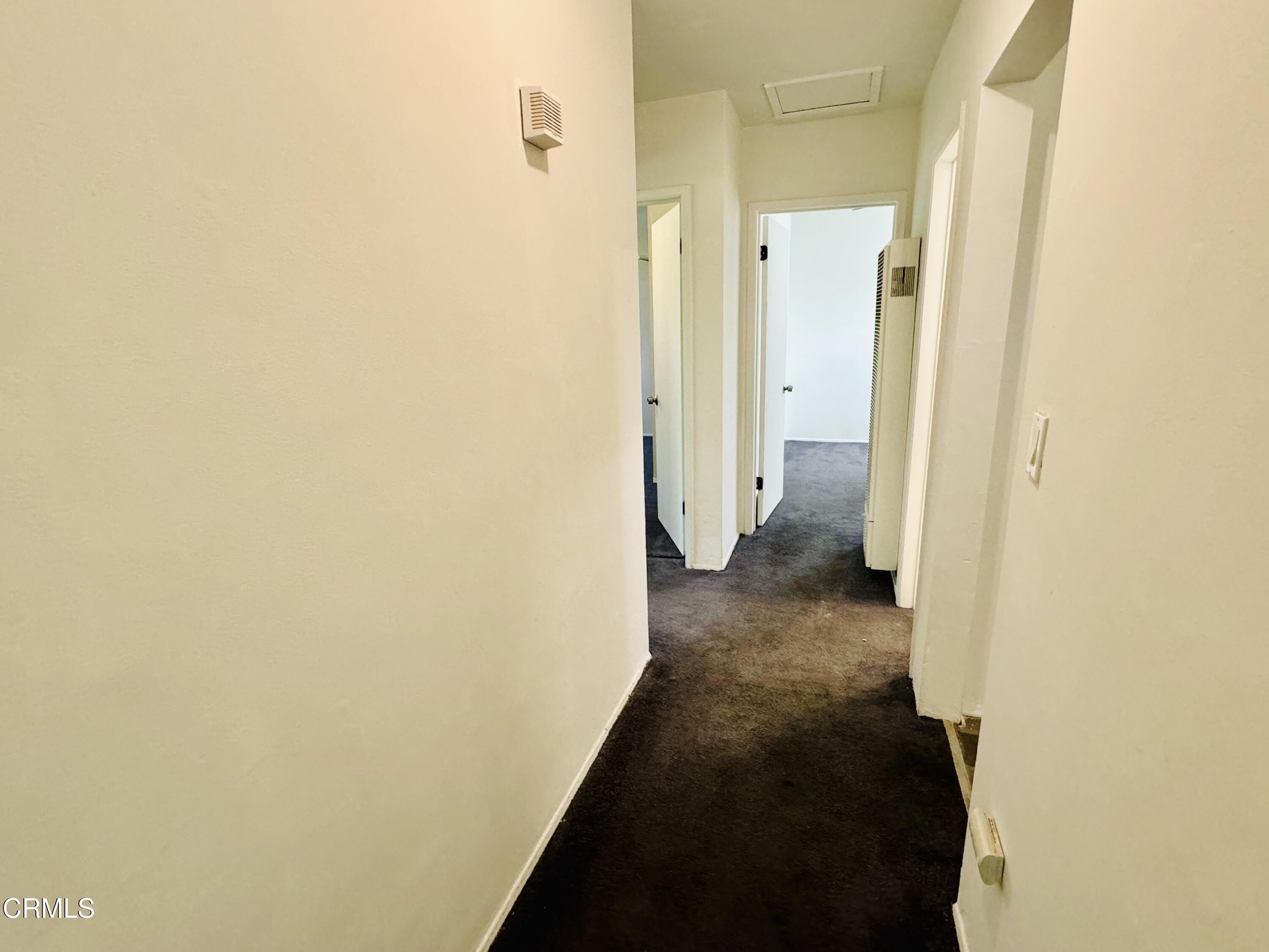 550 MacDonald Street Pasadena, CA 91103 - Photo 24 of 63 a view of a bathroom from a corridor