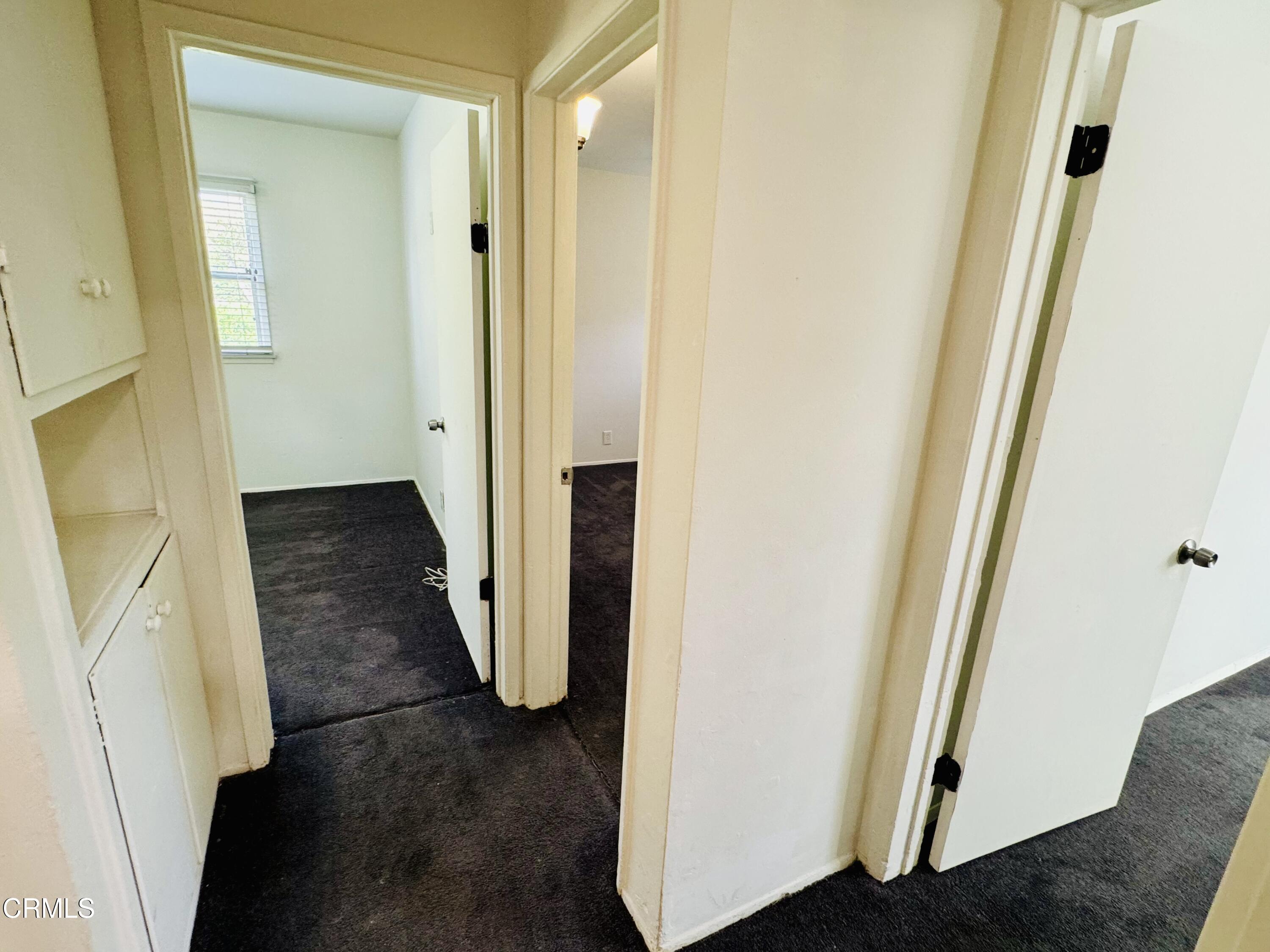 550 MacDonald Street Pasadena, CA 91103 - Photo 26 of 63 a view of a hallway with wooden floor and closet