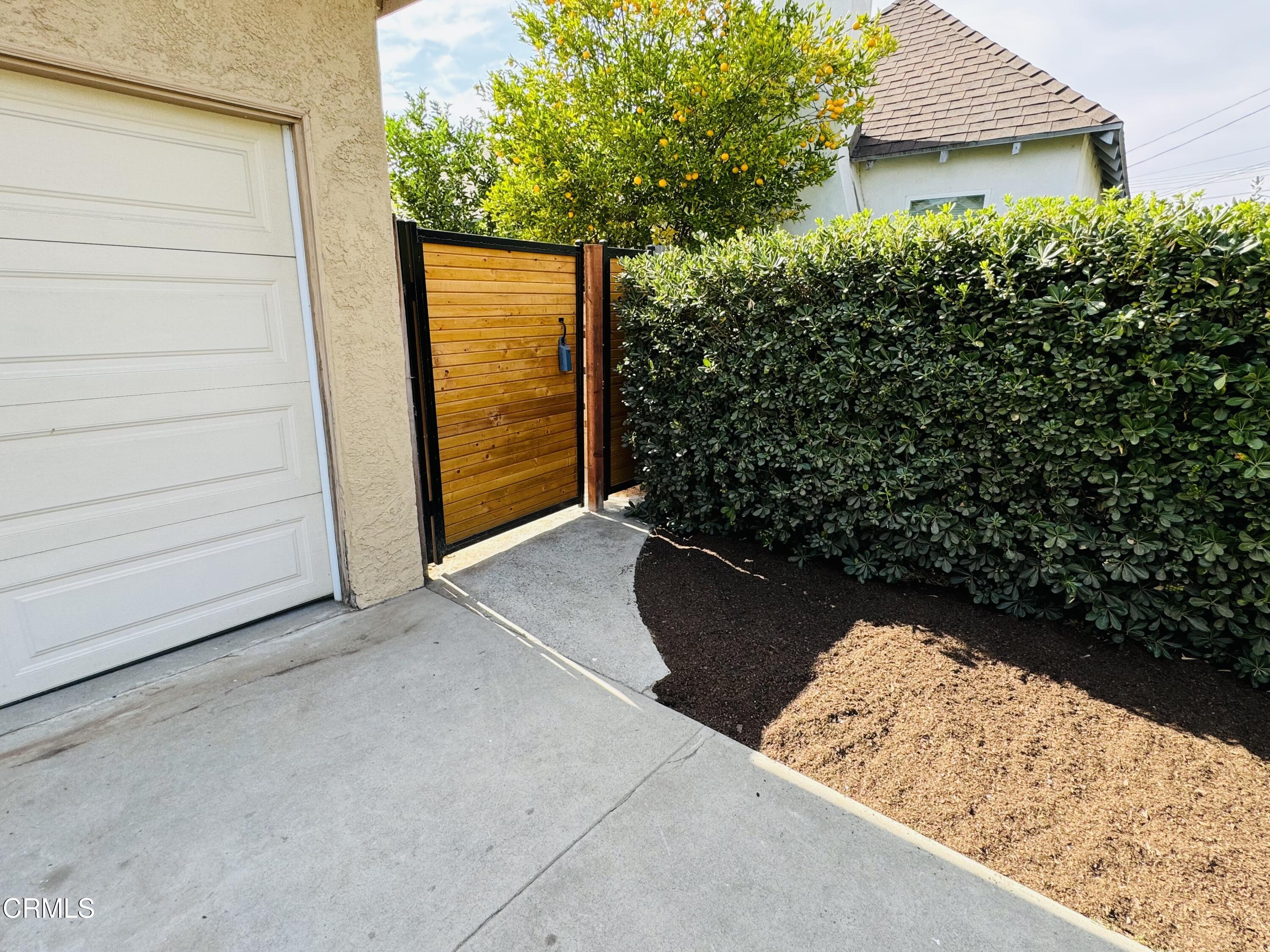 550 MacDonald Street Pasadena, CA 91103 - Photo 3 of 63 a view of a house with a backyard