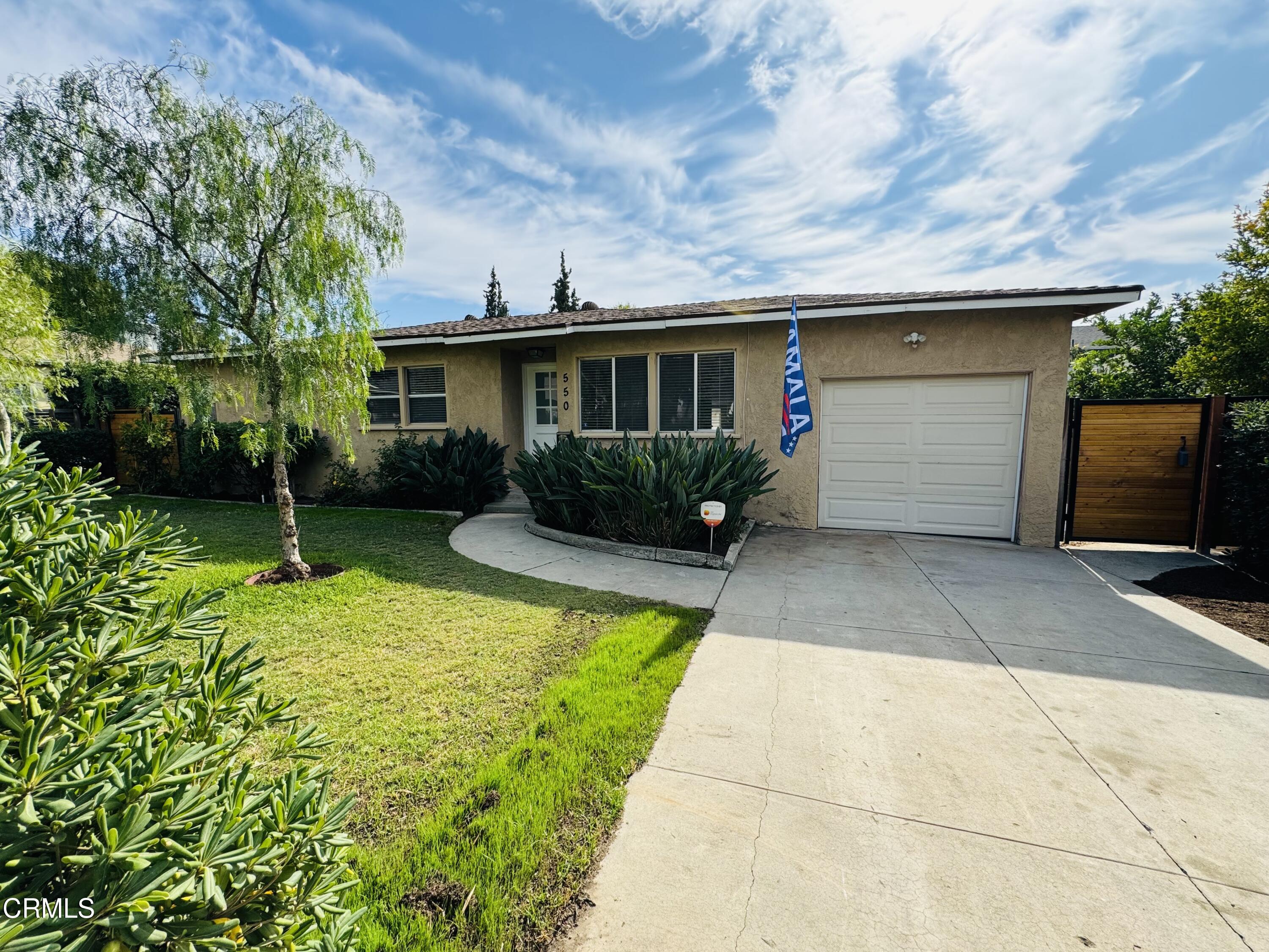 550 MacDonald Street Pasadena, CA 91103 - Photo 33 of 63 a view of a house with backyard and a garden