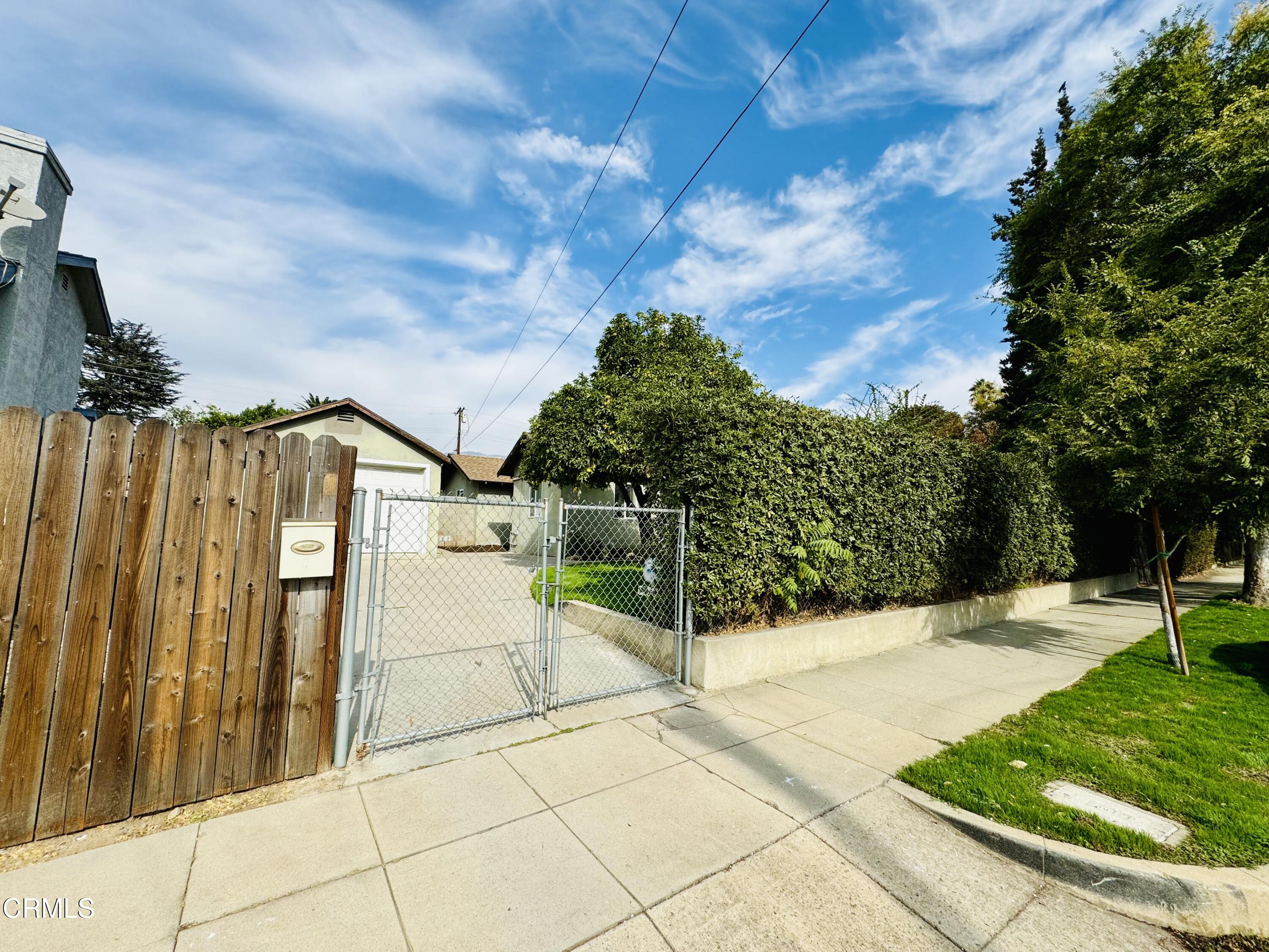 550 MacDonald Street Pasadena, CA 91103 - Photo 35 of 63 a front view of a house with a yard