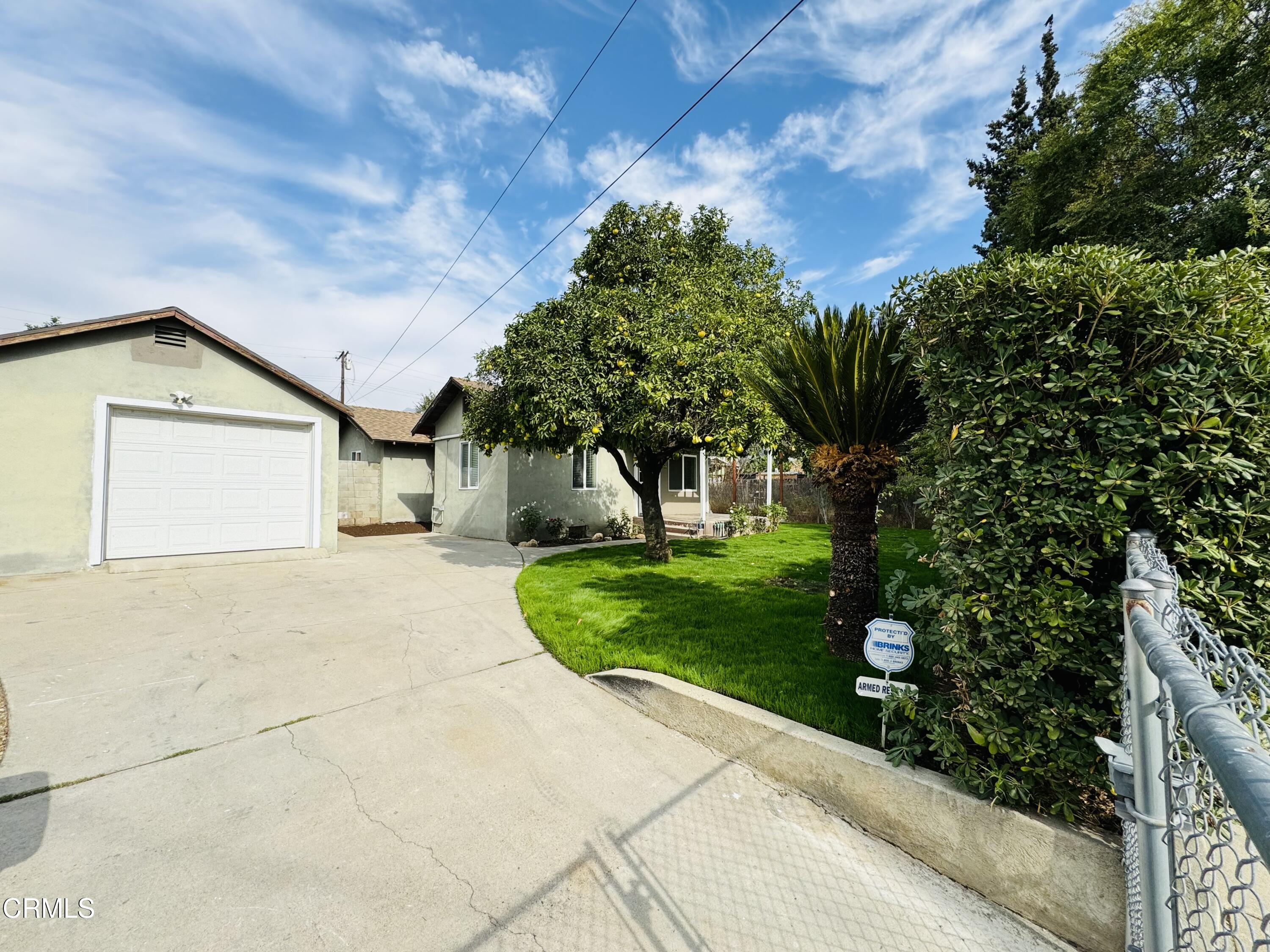 550 MacDonald Street Pasadena, CA 91103 - Photo 36 of 63 a front view of a house with a yard