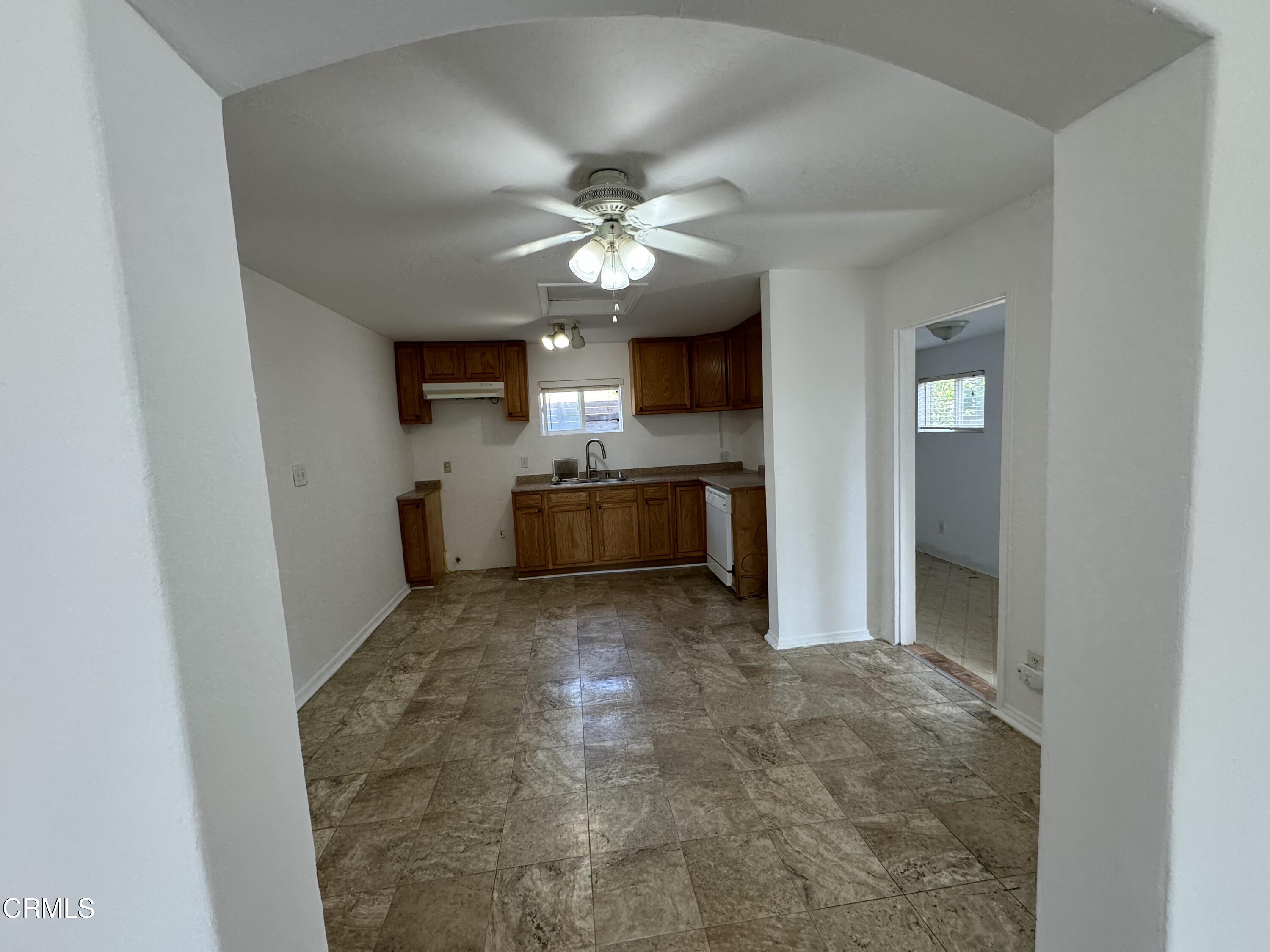 550 MacDonald Street Pasadena, CA 91103 - Photo 45 of 63 a view of a kitchen with a sink and a refrigerator