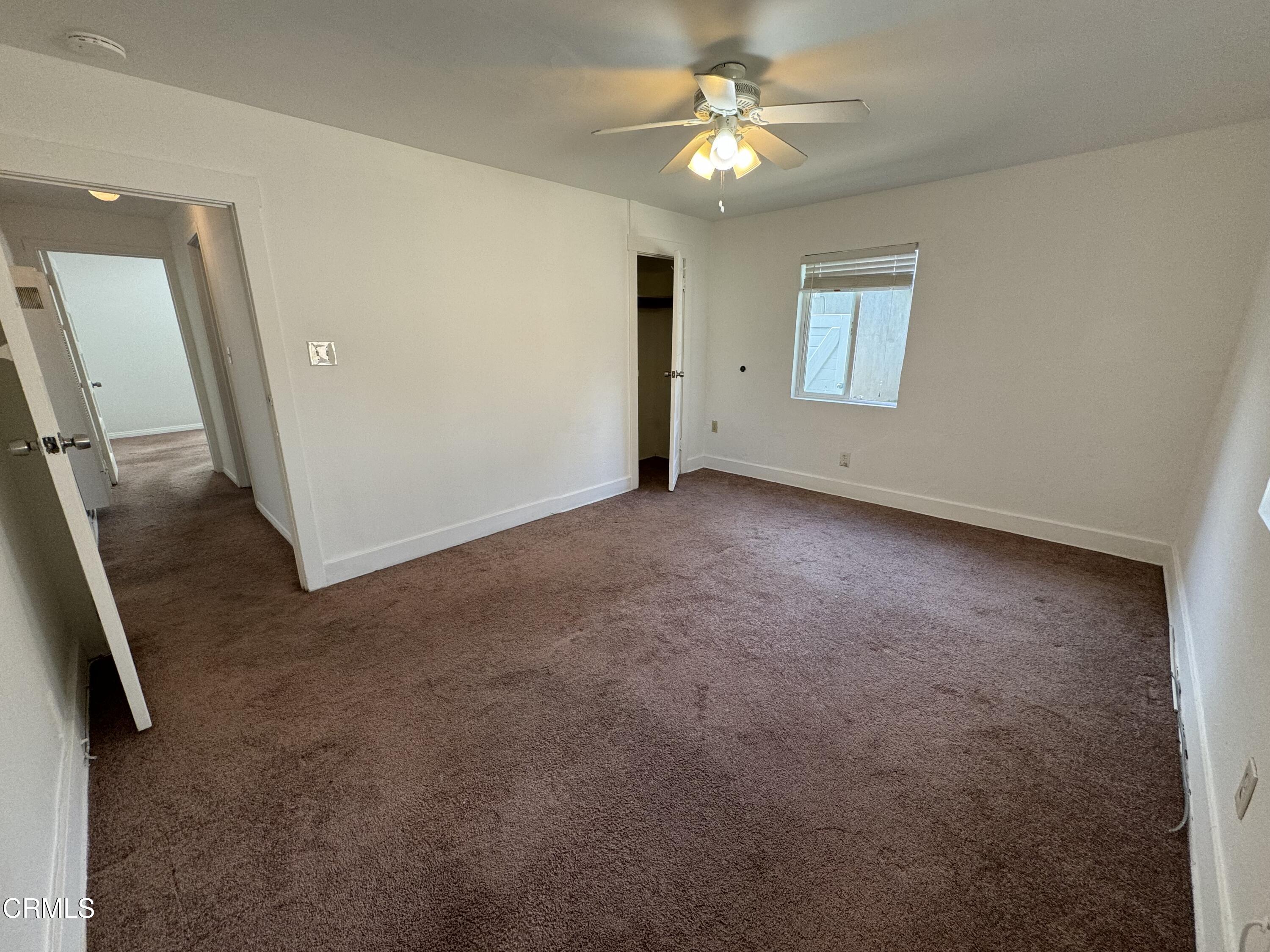 550 MacDonald Street Pasadena, CA 91103 - Photo 55 of 63 an empty room with windows and fan