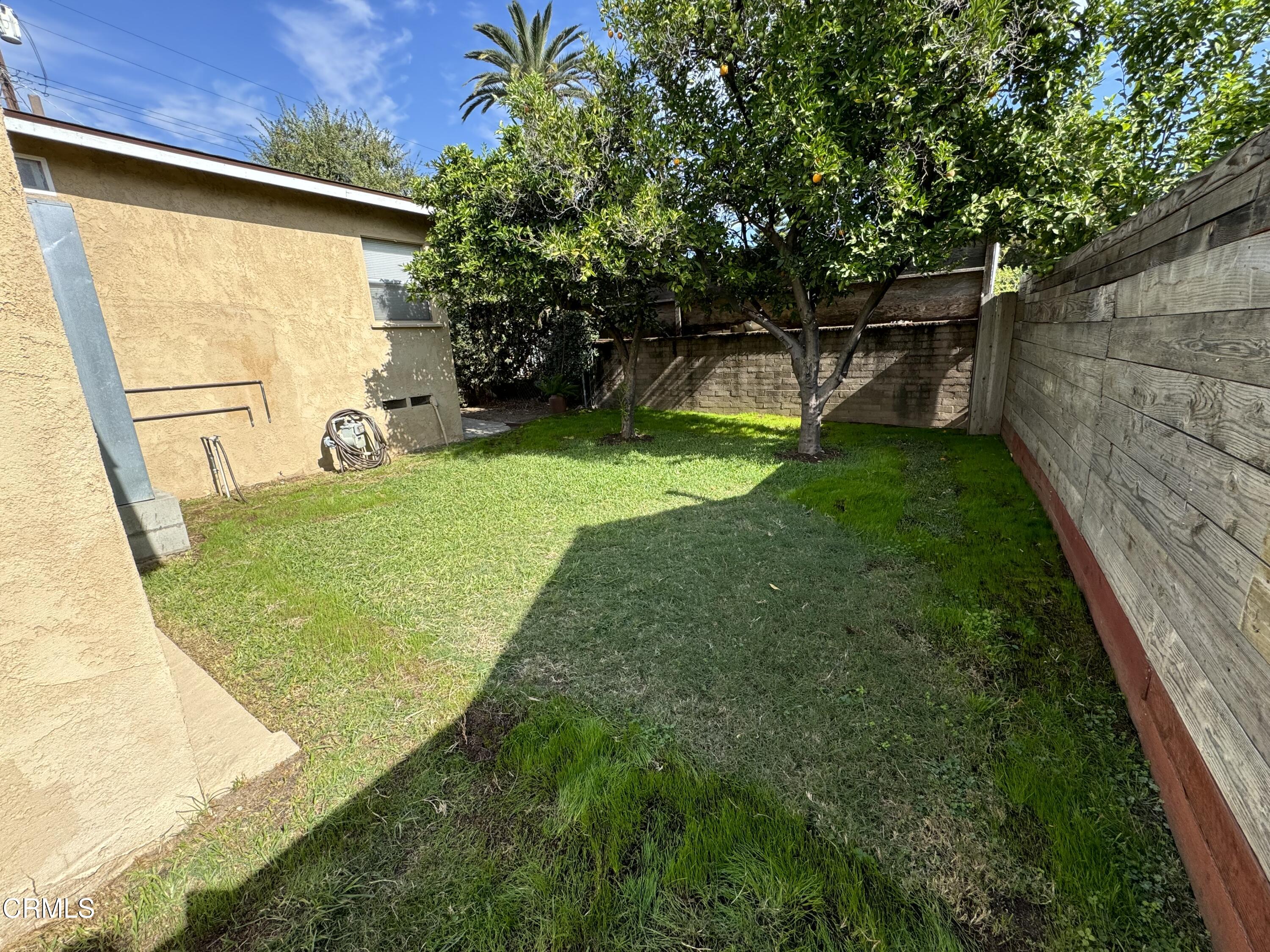 550 MacDonald Street Pasadena, CA 91103 - Photo 60 of 63 a view of a backyard with a small cabin