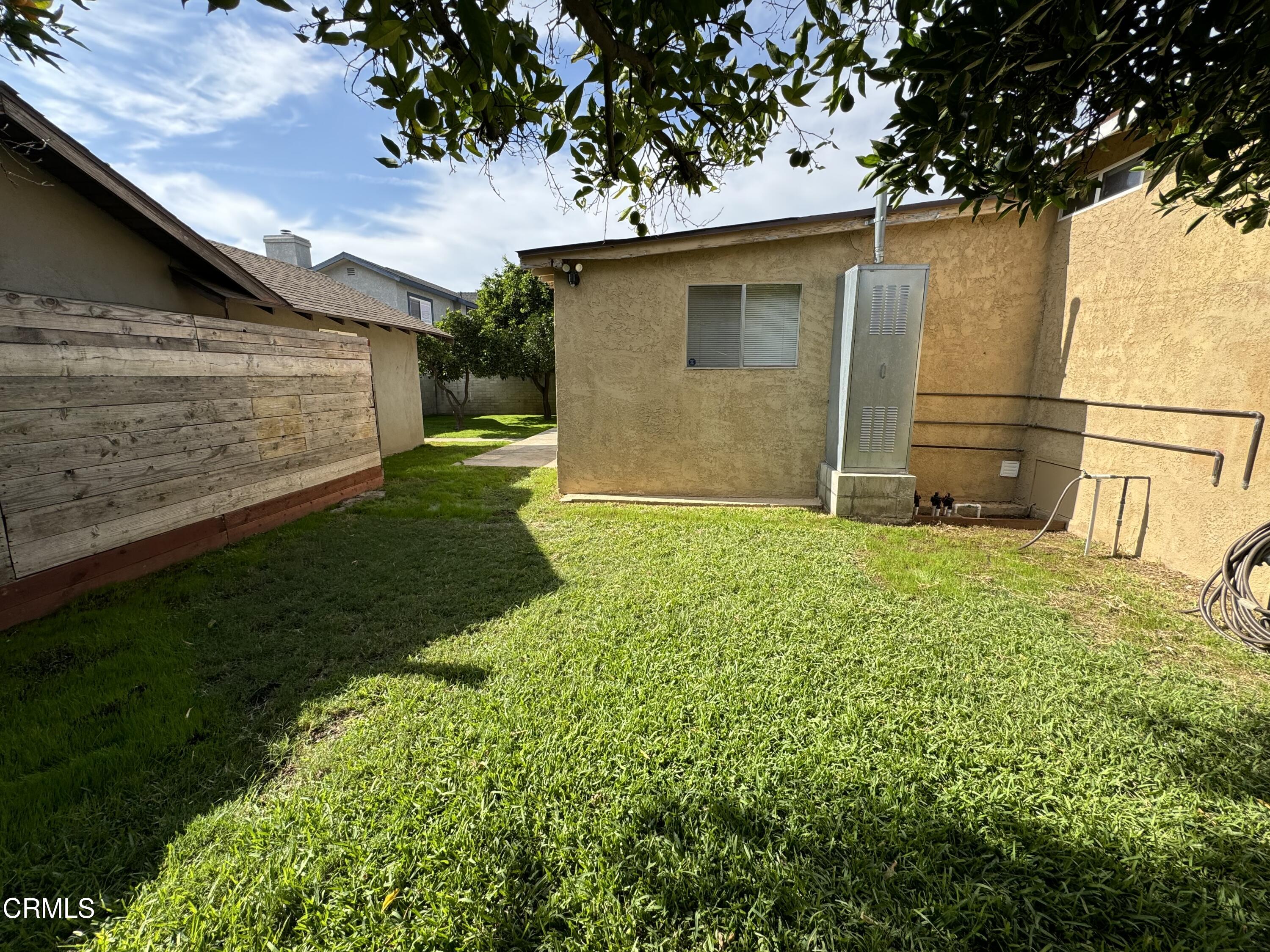 550 MacDonald Street Pasadena, CA 91103 - Photo 61 of 63 a backyard of a house with lots of green space