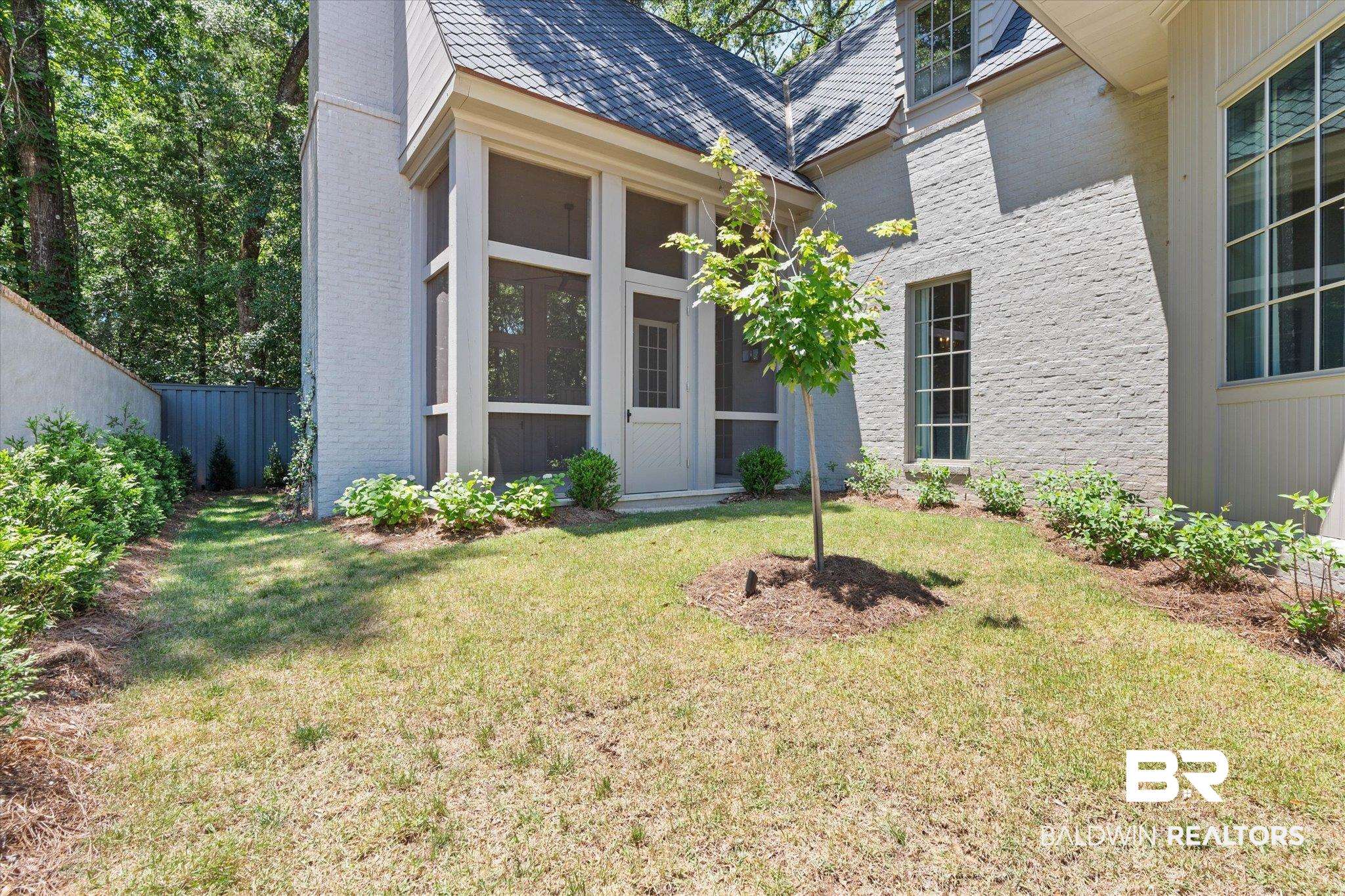 3 Canterbury Park Mobile, AL 36608 - Photo 3 of 43 Property entrance with brick siding and a chimney