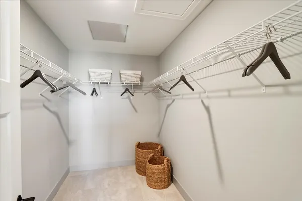 a view of entryway with racks on the wall