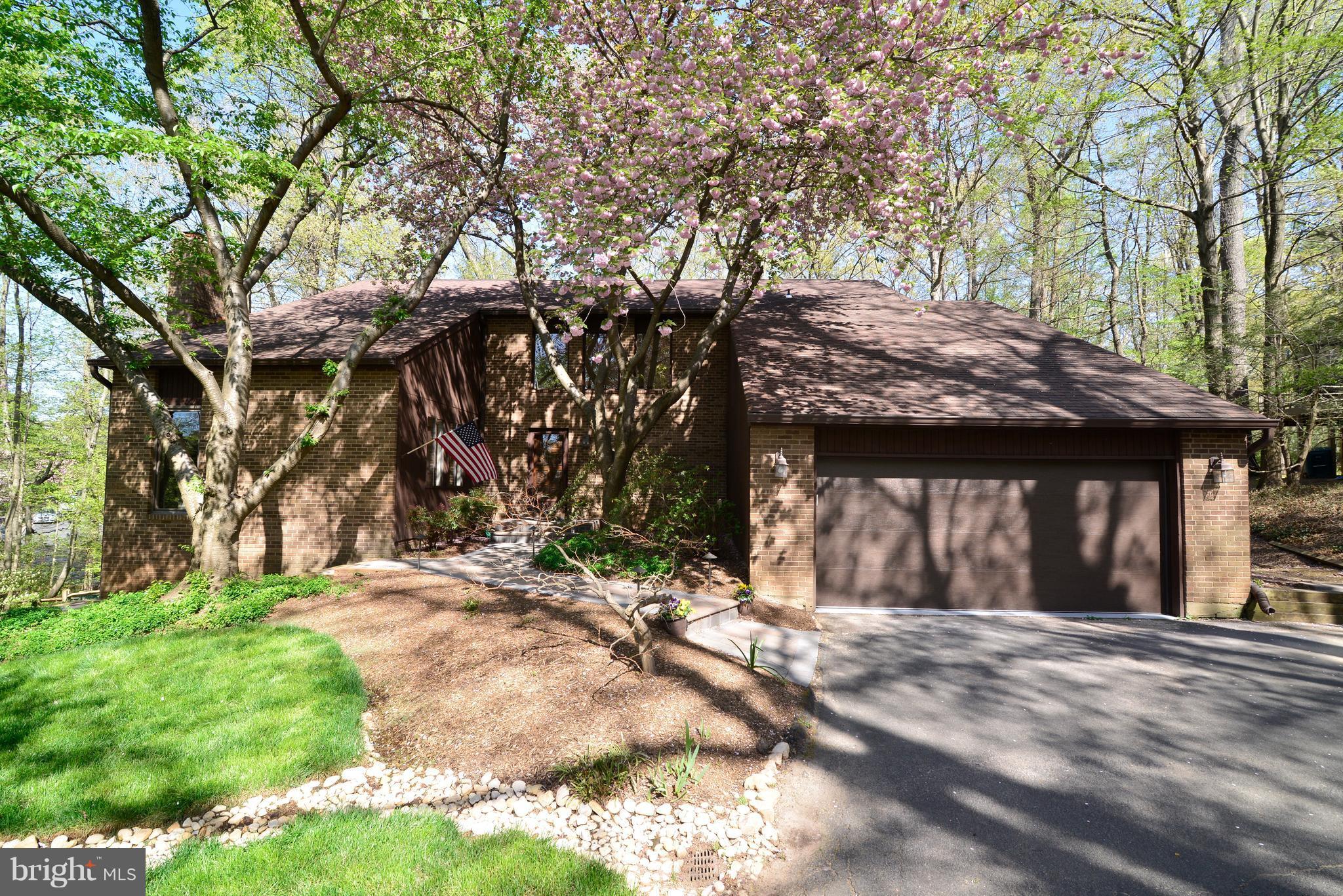 2203 Spinnaker Court Reston, VA 20191 - Photo 1 of 30 a front view of a house with a yard