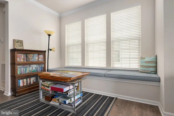 a room with furniture and a window