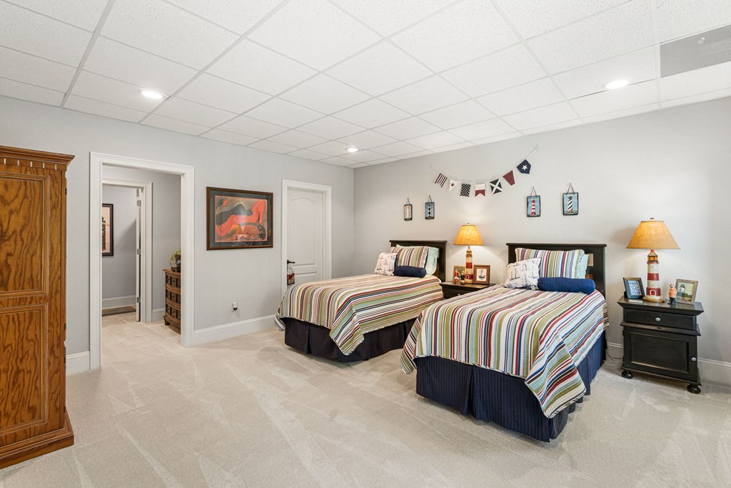 5125 Mineral Springs Road Young Harris, GA 30582 - Photo 25 of 62 a spacious bedroom with a bed and a painting on the wall