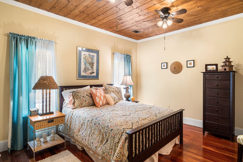 5125 Mineral Springs Road Young Harris, GA 30582 - Photo 26 of 62 a bedroom with a bed a dresser and chair
